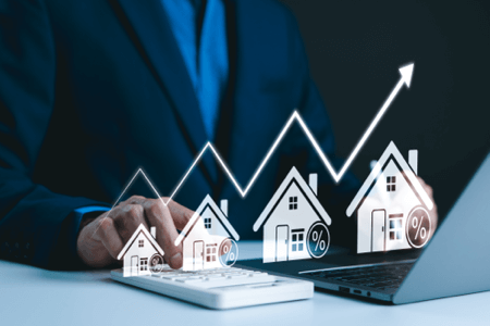 Real estate agent analyzing housing market growth and prices for clients wanting to sell my house in Pensacola.